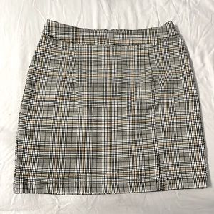 Plaid gray yellow and white shirt with a slit on the left side